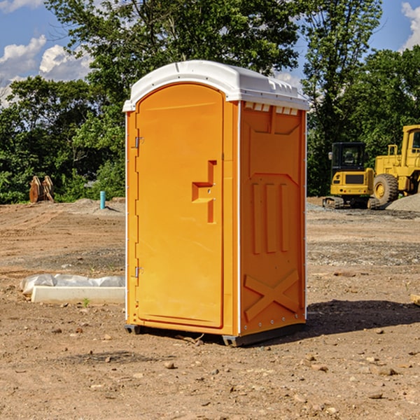 how often are the portable restrooms cleaned and serviced during a rental period in Pineola